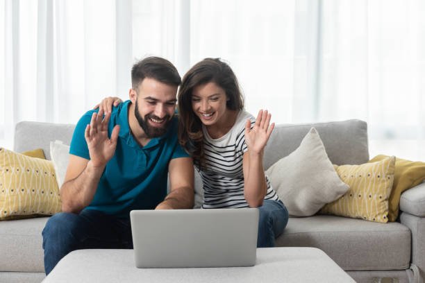 Couple attending online Couple Counselling session from home.